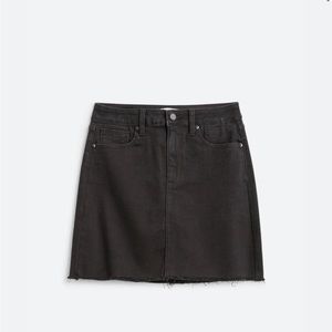 Black denim mini skirt. Never worn.